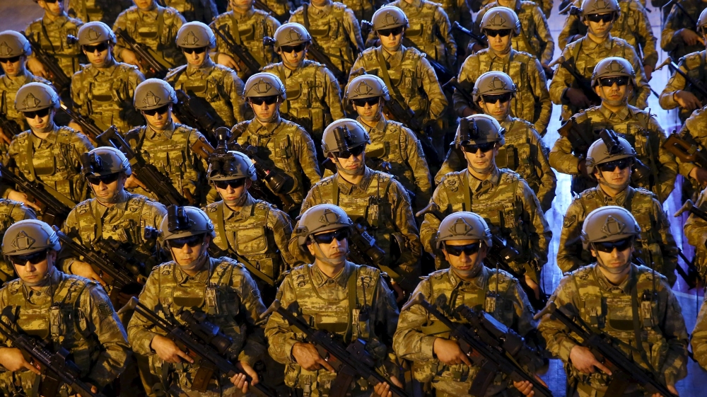 Presidential Palace handout photo shows commandos listening to Turkish President Erdogan during his visit to the Gendarmerie Commando Special Forces headquarters in Ankara