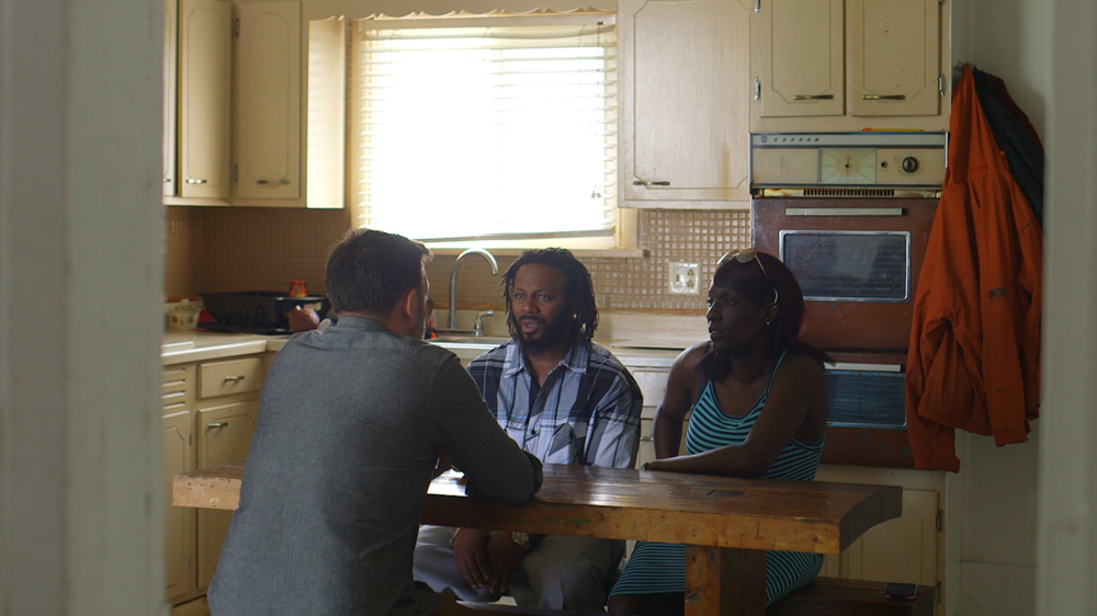 Ebony Holmes and her husband could not see the lead inside their son's blood, but they saw Joshua's behaviour change dramatically [Al Jazeera]