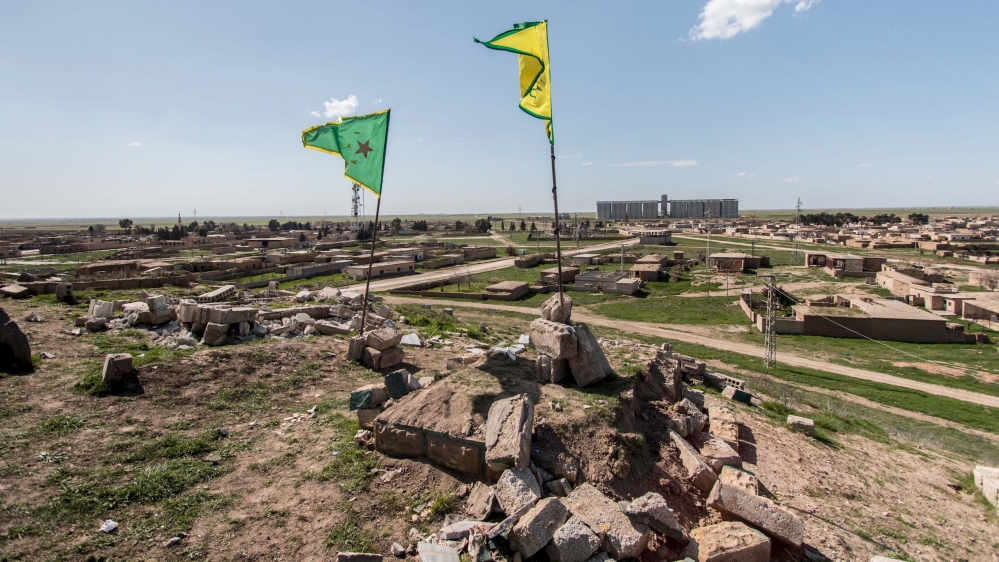 File photo of Kurdish YPG flags in Tel Hamis in Hasaka countryside after YPG took control of the area