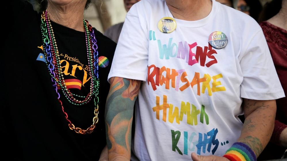 Two women show support for women''s rights and presumptive Democratic presidential nominee Hillary Clinton at San Francisco LGBT Pride Parade in San Francisco, California