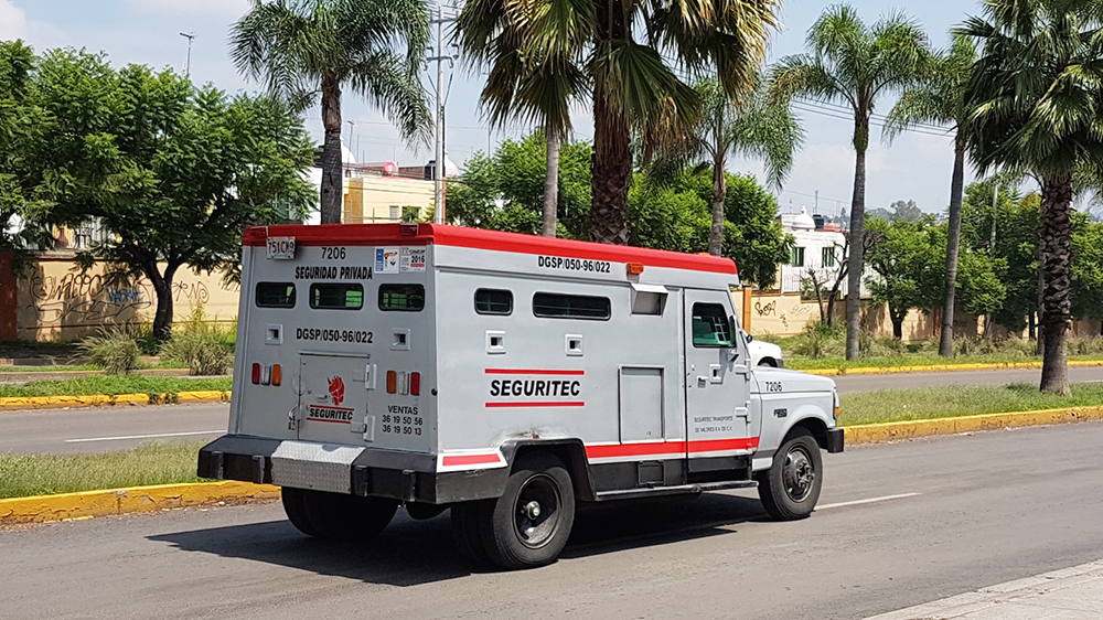 A Seguritec van rumbles through Guadalajara.