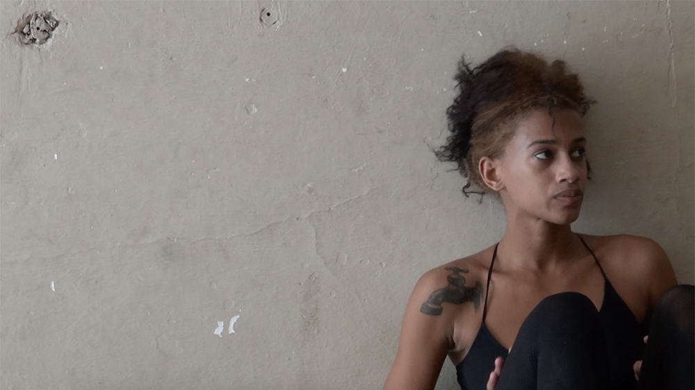 Ines Maria Preval, 21, was born, raised and still lives in Caimanera, the small town on the frontline with the US naval base of Guantanamo [Sylvia Hines/Al Jazeera]