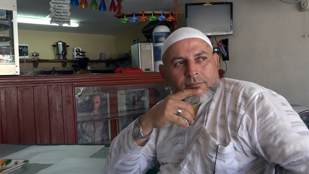 Sport Cafe owned by a Muslim and a non-Muslim, currently serves no alcohol, but it does make dishes featuring pork, which is widely eaten in Cuba [Sylvia Hines/Al Jazeera]