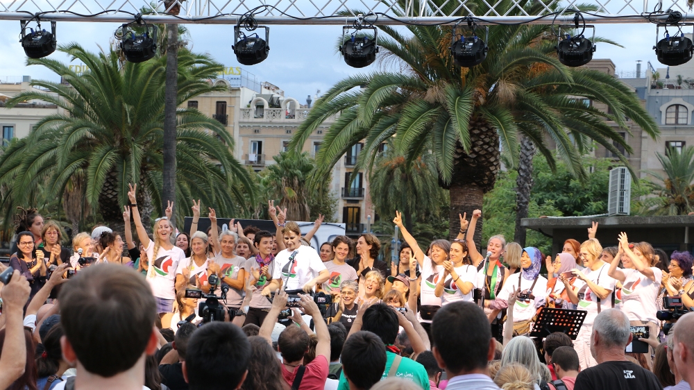 Crowds gathered to wish the activists luck before they set sail [Laura Burdon-Manley/Al Jazeera]