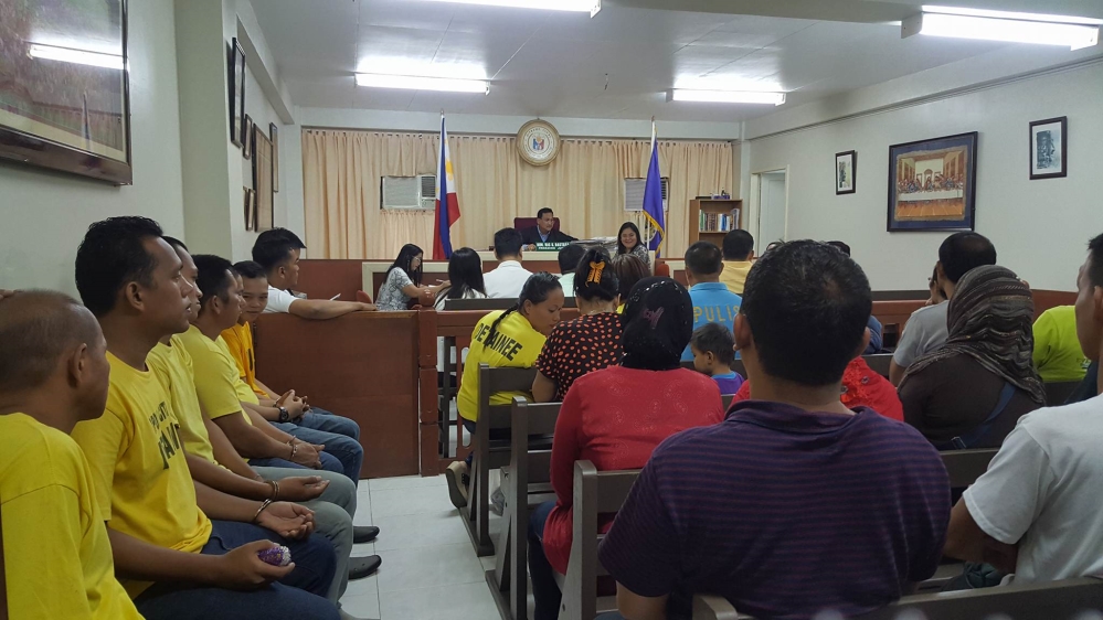 Muloc and other defendants in court on Thursday [Ted Regencia/Al Jazeera]