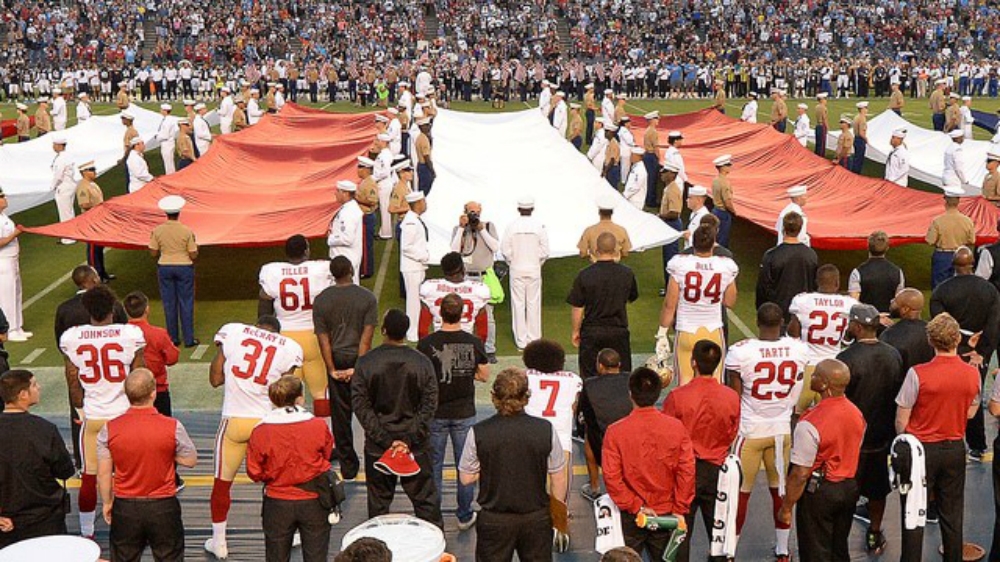 San Francisco 49ers quarterback Colin Kaepernick's protest during the Star Spangled Banner resonates in African-American community as the NFL season starts and other players join [Reuters]