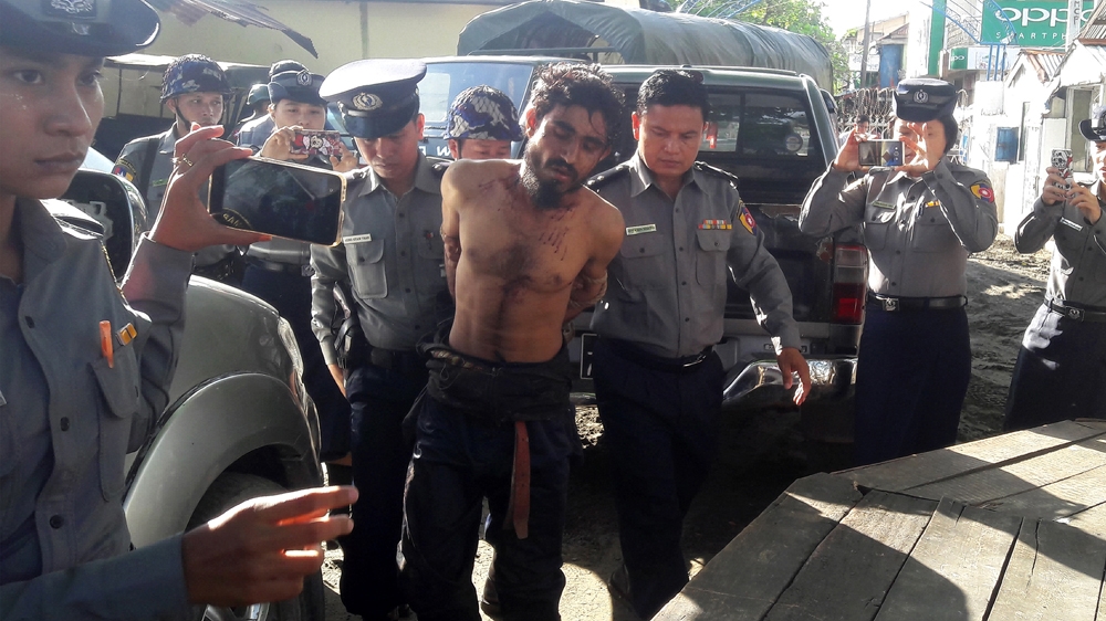 Two Muslim men captured during Sunday's attacks have reportedly confessed [Stringer/AFP]