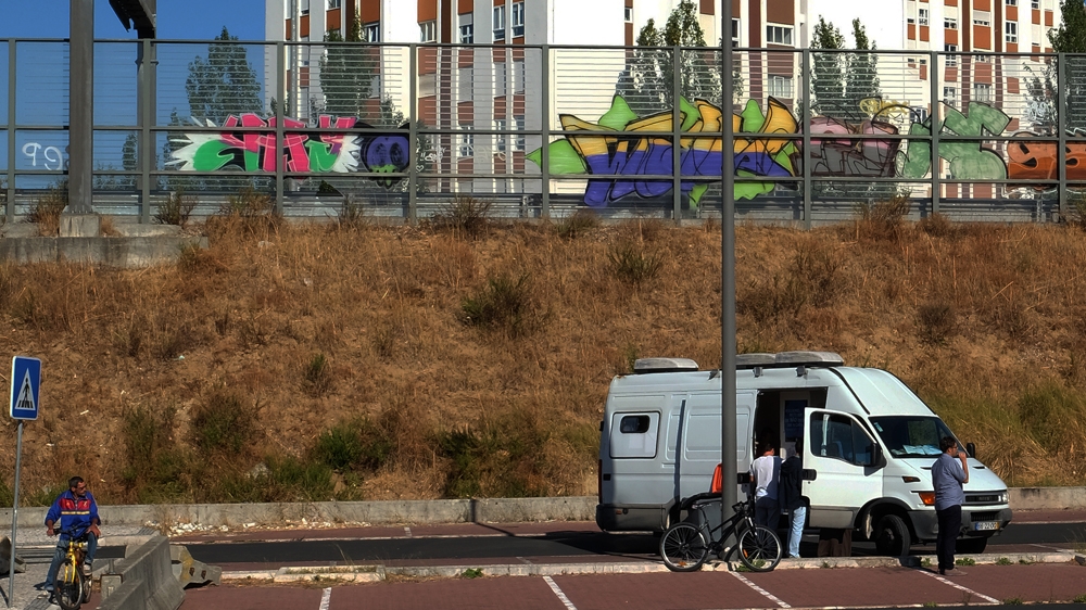 Every Friday morning the methadone van of Ares do Pinhal parks in an empty parking lot close to a drug-dealing district. It's difficult to find spots for distribution because residents don't want the van close to their homes [Eline van Nes/Al Jazeera]
