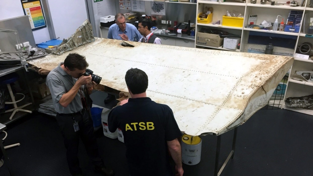 Australian and Malaysian investigators examine Tanzania debris thought to belong to MH370