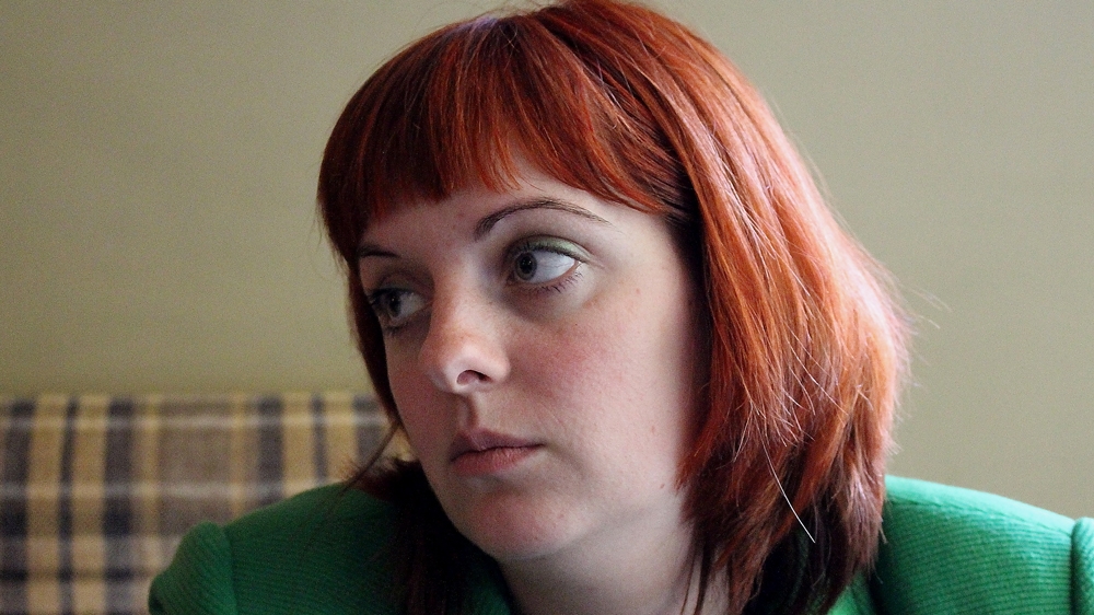 After seeing a Russian news report showing her husband captured but alive, Viktoriya Markina remains convinced that two years on he is still alive [Matthew Vickery/Al Jazeera]