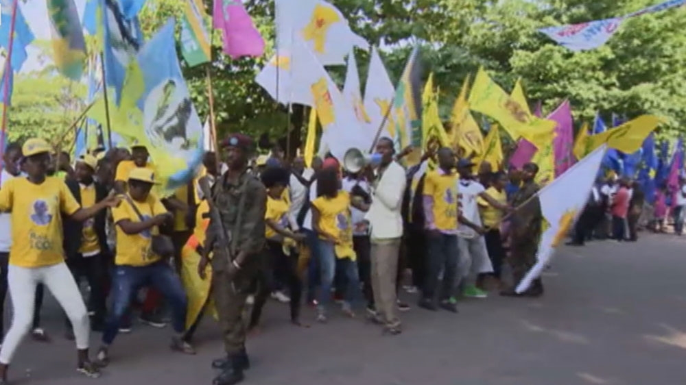 Supporters of Kabila rally behind the proposal the reschedule the election to April 2018 [Al Jazeera]