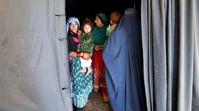 Afghan women arrive at a UNHCR registration centre in Kabul, Afghanistan [Reuters]