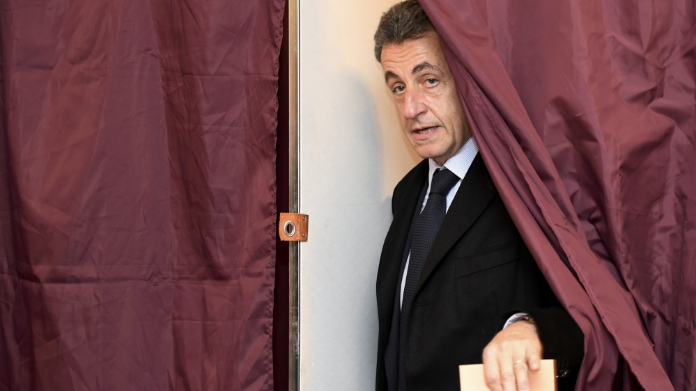 Nicolas Sarkozy, former French president and candidate for the French conservative presidential primary, votes in the first round of the French center-right presidential primary election in Paris