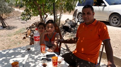 Nimer Tirawi fears that his land will eventually be appropriated for Israeli use [Emily Mulder/Al Jazeera]