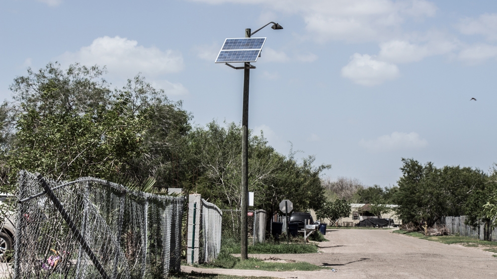 
Located just 17 kilometres outside the border town of Mission, the Mi Sueno colonia is a single, pothole-ridden street lined with wooden and concrete houses, trailers, shacks and car parks [Shaghayegh Tajvidi/Al Jazeera] 