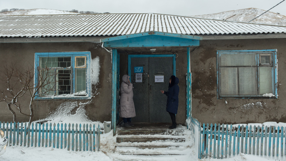 Locals say living costs are expensive while are salaries low, forcing them to work several jobs to make ends meet [Andrey Kovalenko/Al Jazeera]