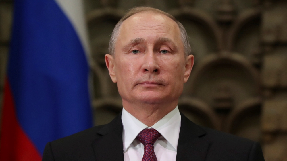 Russian President Vladimir Putin attends a signing ceremony in Tokyo