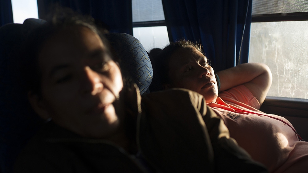 Lilian, left, last heard from her sister just before crossing the Arizona desert, in Altar, Sonora. Noemi, right, is looking for her teenage son, he was 15 year of age when he disappeared, he was crossing the desert with her cousin and they all run away when they heard people talking on their radios, he hasn't been seen since [Encarni Pindado/Al Jazeera]