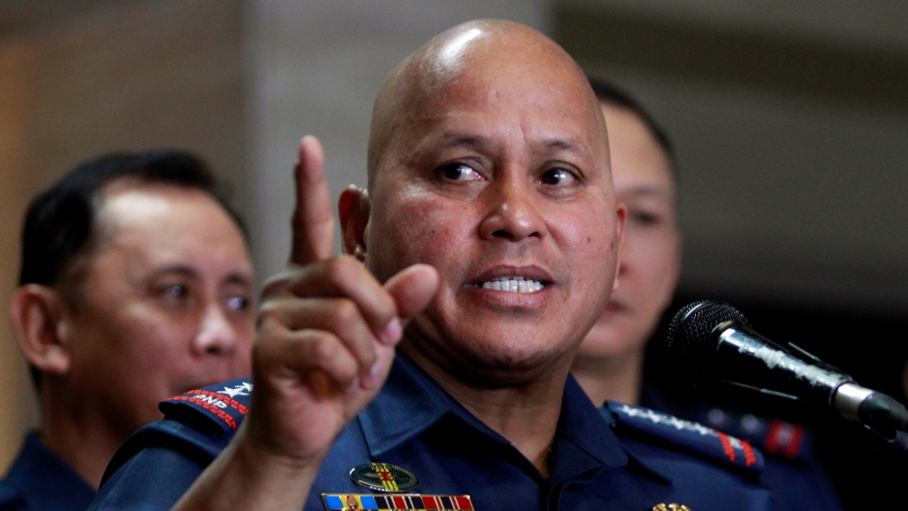Philippine National Police Director General Ronald Dela Rosa gestures during a news conference at the PNP headquarters in Quezon