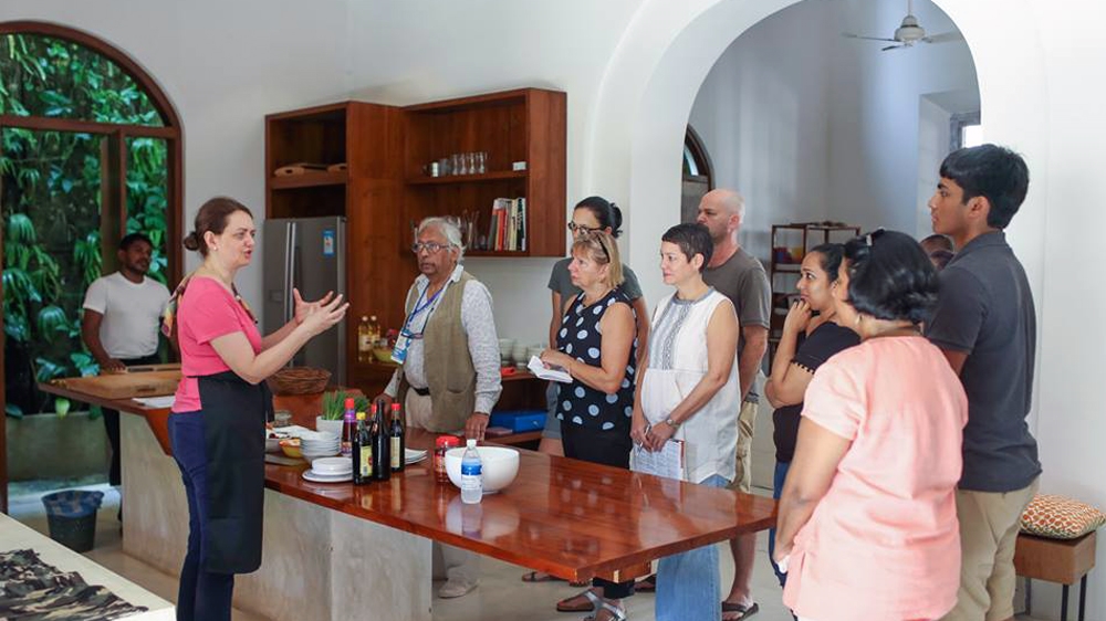 Dunlop holds a class on traditional Chinese cooking in the southern Sri Lankan city of Galle [Image courtesy the Fairway Galle Literary Festival]