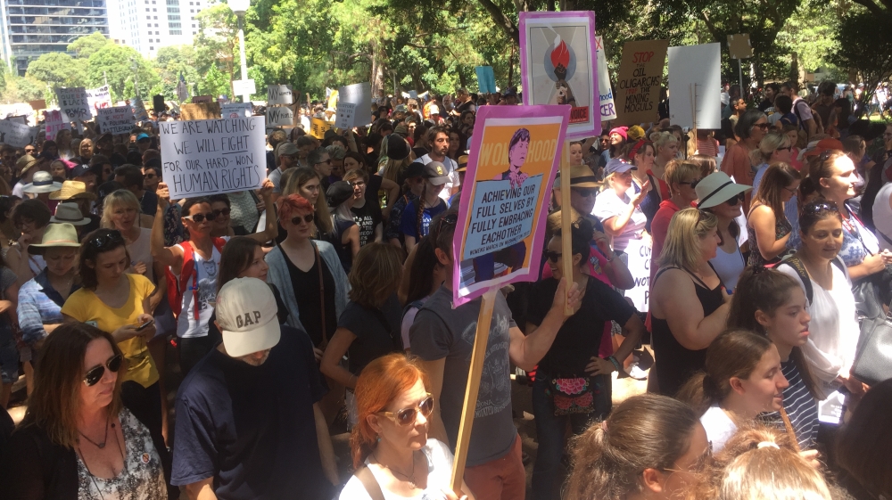 The Sydney march took a stance for women's rights and refugees [Andrew Thomas/Al Jazeera]