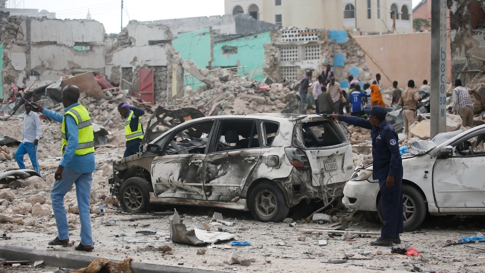 Somali government soldiers secure the scene after the attack at Dayah Hotel [Feisal Omar/Reuters]