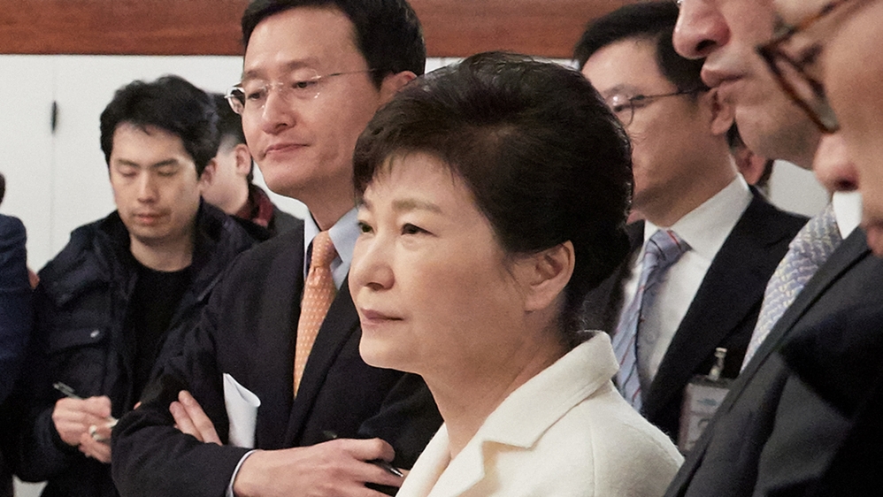 South Korean President Park Geun-hye listens to a reporter''s question during a meeting with reporters at the Presidential Blue House in Seoul