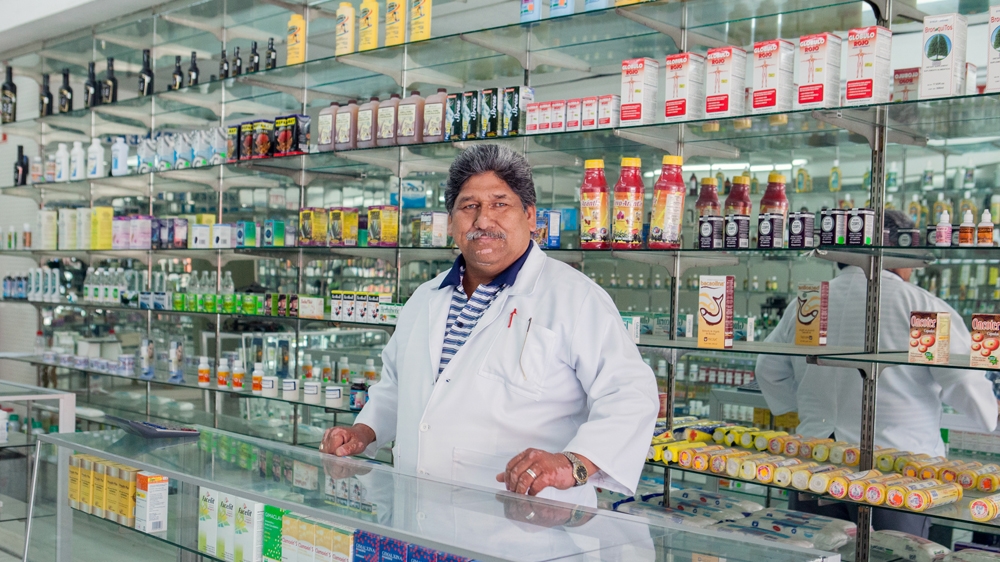 Esteban Ochoa, a Tijuana pharmacy worker, says he is worried for Americans who can't afford healthcare costs in the US and who will no longer be able to easily cross into Mexico to buy medication [Jessica Chou/Al Jazeera] 