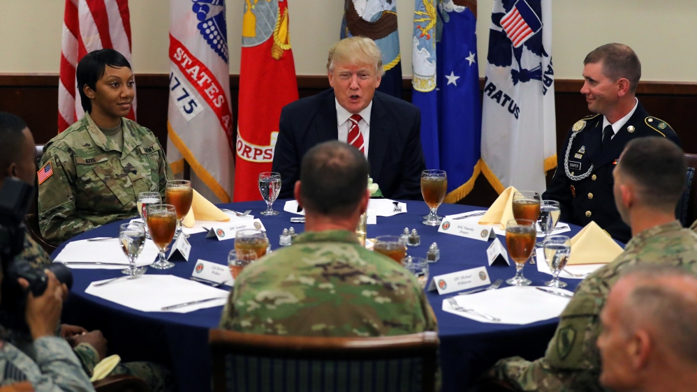 U.S. President Donald Trump attends a lunch with members of the U.S. military during a visit at the U.S. Central Command (CENTCOM) and Special Operations Command (SOCOM) headquarters in Tampa