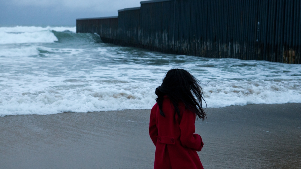 The US-Mexico wall as seen from Playas de Tijuana in Mexico [ Jessica Chou/Al Jazeera] 