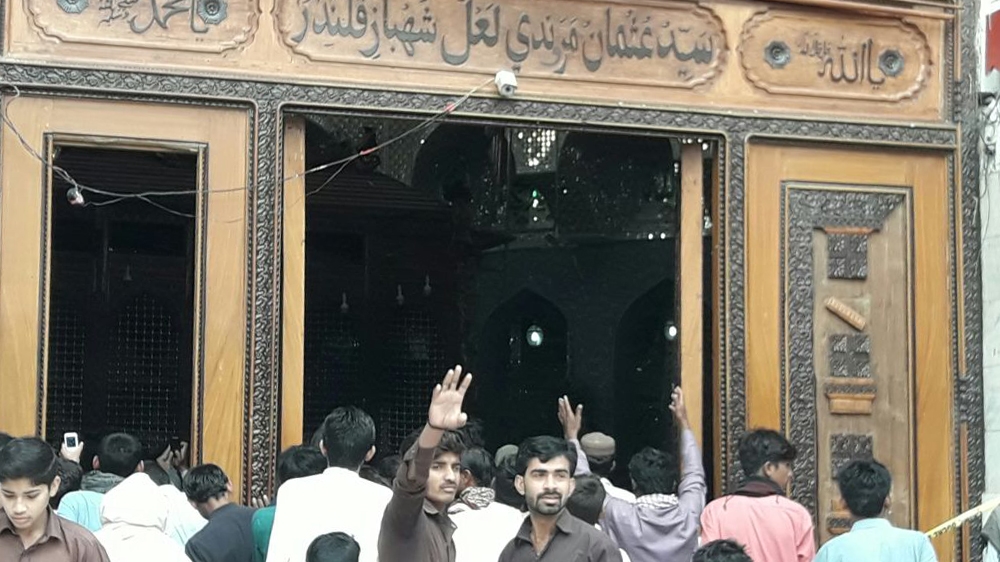 
Thursday's attack was the deadliest in Pakistan since 2014 [Wali Muhammed/Al Jazeera] People arriving at the scene of the blast on Friday [Wali Muhammed/Al Jazeera]
