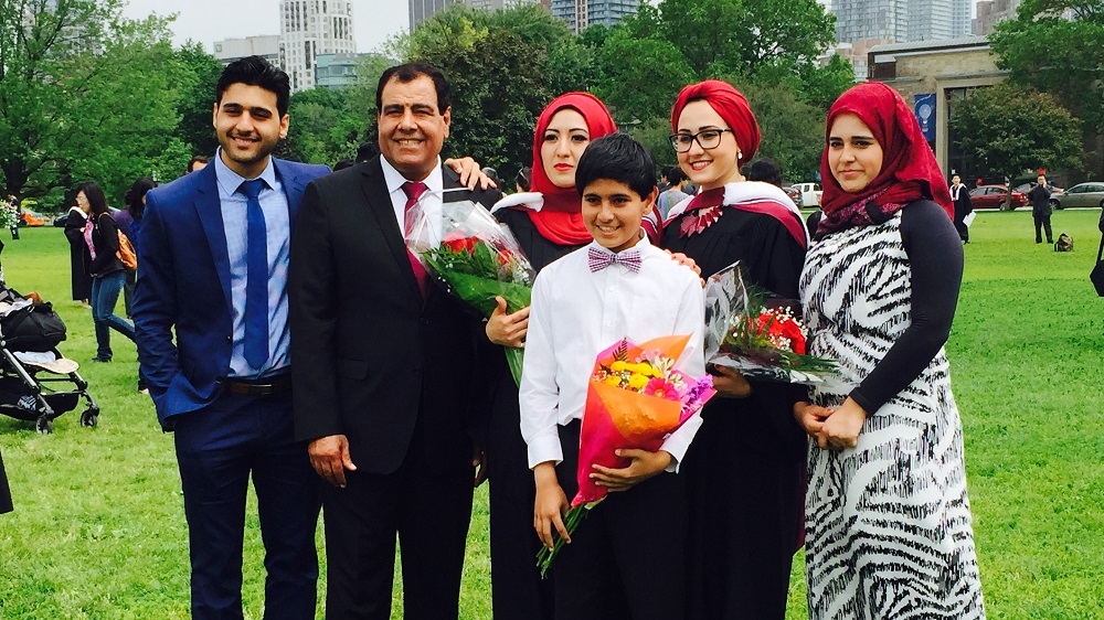 Abuelaish, an infertility specialist and University of Toronto associate professor, poses with his children following a graduation ceremony in Toronto [Photo courtesy of Izzeldin Abuelaish]
