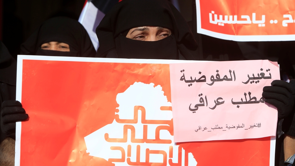 Supporters of Iraqi Shi''ite cleric Moqtada al-Sadr attend a protest demanding an overhaul of the elections'' supervision commission ahead of provincial elections due in September, in Baghdad
