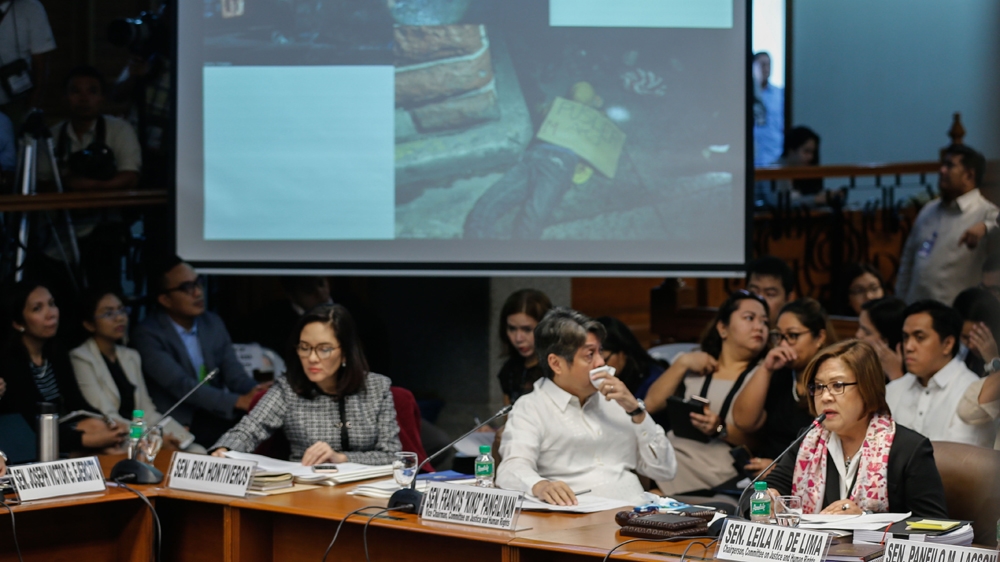  De Lima has branded President Duterte a 'sociopathic serial killer' because of his drug war policy that has left more than 7,000 people dead [File: EPA]