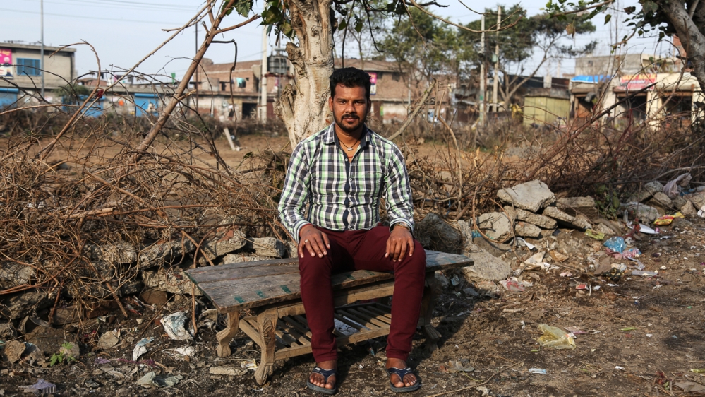 Nand Kishore says factory owners are taking advantage of the situation by offering salaries that are half what they used to be [Showkat Shafi/Al Jazeera]