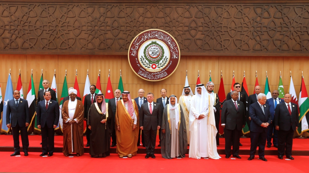 Arab leaders and head of delegations pose for a group photograph during the 28th Ordinary Summit of the Arab League at the Dead Sea