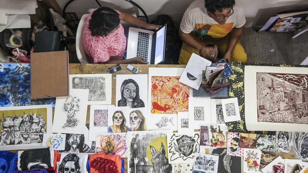 
Oaxacan artists showcase their prints at the 3rd annual Feria Graphica [Gabriela Campos/Al Jazeera] 