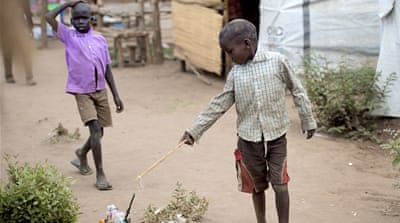 Bottles are made into toy cars and trucks [Yilmaz Polat/Al Jazeera]