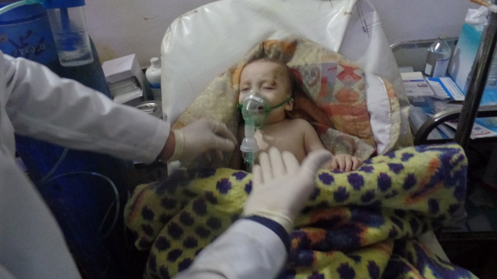'I want him [Assad] to see the faces of the children who woke up choking in the middle of the night.' [Courtesy of Sarmin field hospital/Al Jazeera]