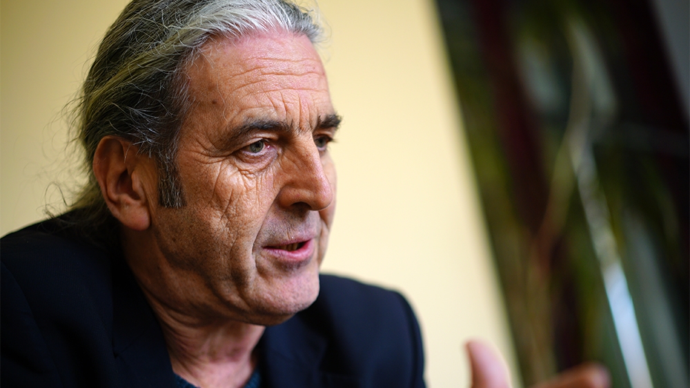 Karl Kobb of PRO-ASYL says Germany can accept more refugees and migrants [Sorin Furcoi/Al Jazeera] 