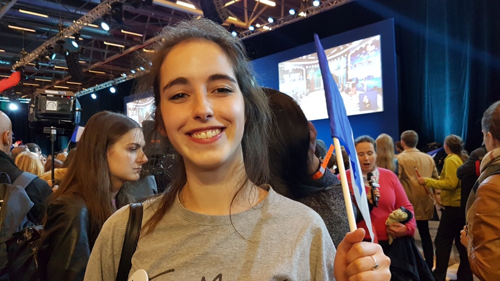  Elmire says she is pleased Macron is through to the second round [Shafik Mandhai/Al Jazeera] Elmire says she is pleased Macron is through to the second round [Shafik Mandhai/Al Jazeera]