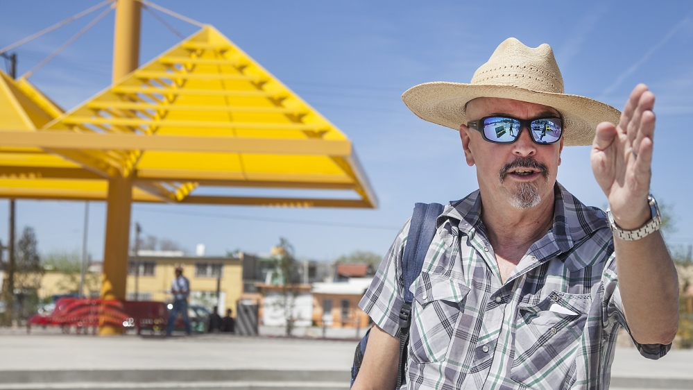 Richard Wright leads a tour through Ignacio Mariscal Street, the former red light district of Juarez. [Gabriela Campos/Al Jazeera]