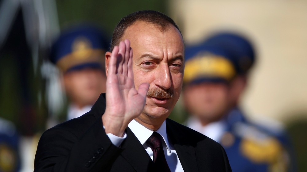 Azerbaijan''s President Ilham Aliyev waves during a meeting with Pope Francis at the Presidential Palace in Ganjlik