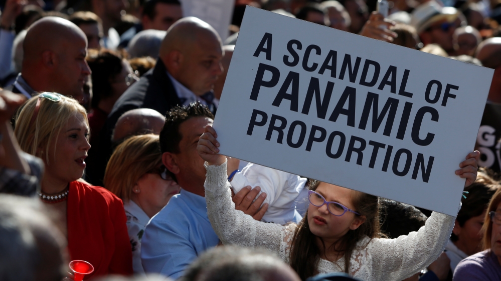 Protestors take part in a national protest against the government of Prime Minister Joseph Muscat, in Valletta