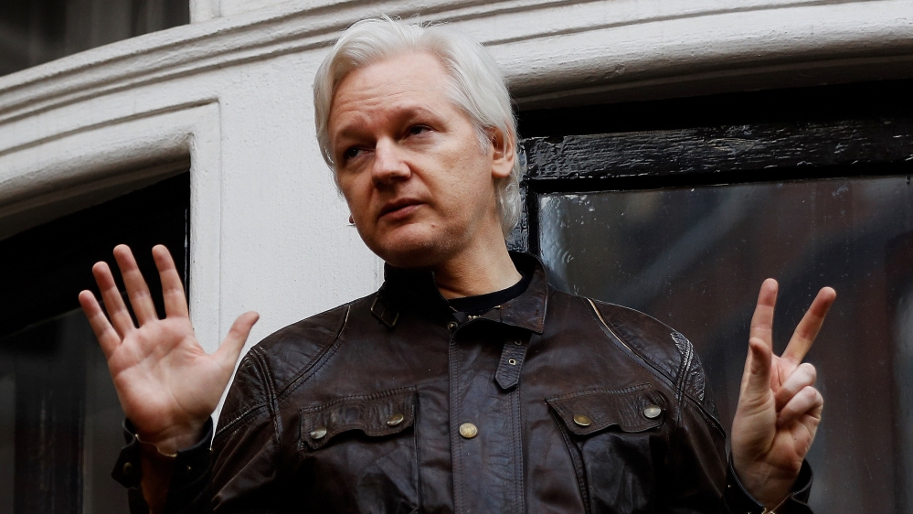 WikiLeaks founder Julian Assange is seen on the balcony of the Ecuadorian Embassy in London
