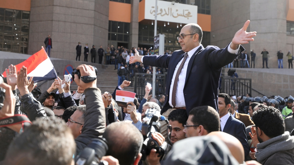 Ali reacts in front of the State Council courthouse in Cairo
