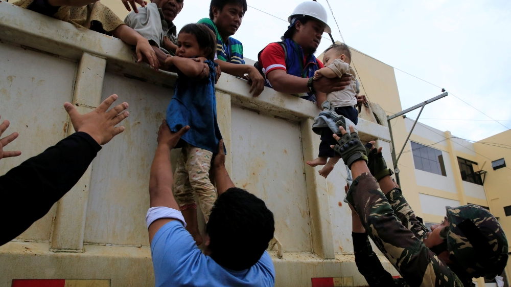 Thousands of civilians have fled the fighting in Marawi [Romeo Ranoco/Reuters]