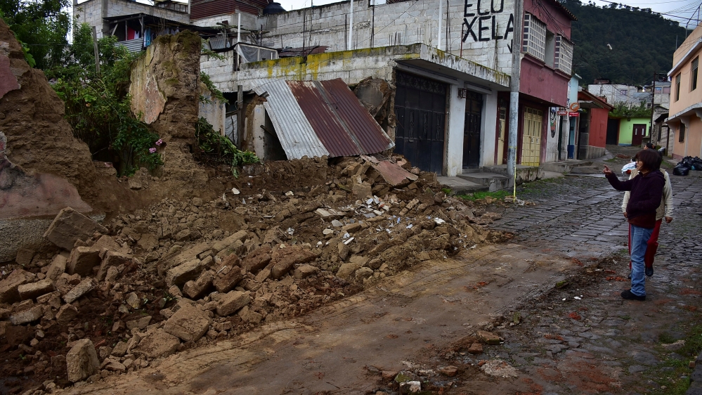 Various buildings made of mud and straw collapsed as a result of the earthquake [Reuters]