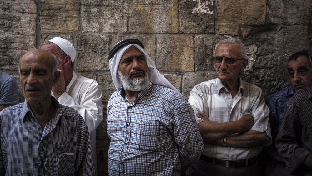 Metal detectors and turnstiles have been installed at the entrance of al-Aqsa Mosque [Ilia Yefimovich/Getty]