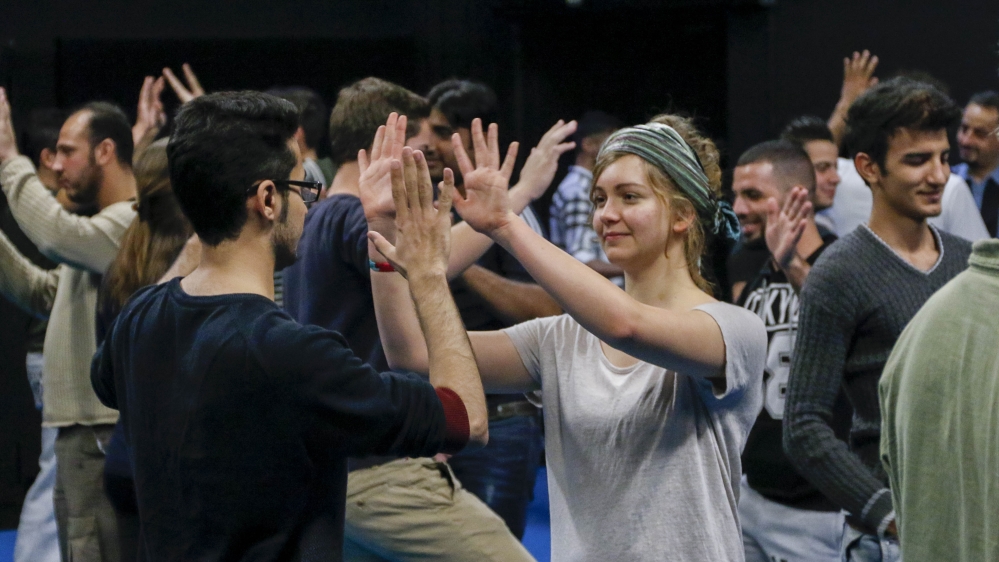 
The international cafe allows Dresden locals and refugees to mingle in a city which is known for its anti-refugee politics [Daniel Koch/Staatsschauspiel Dresden]
